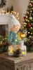 MagicHome, karácsonyi figura, kisfiú sámlin ülve bagollyal, 1 LED, polirezin, 10,5x10,5x19,5 cm